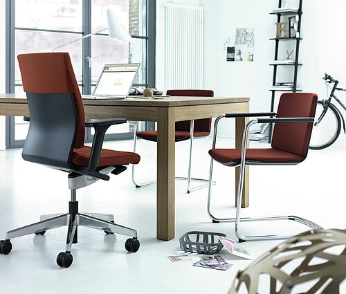 Neos chair at desk in modern office workspace