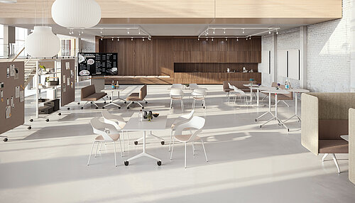 Confair Next elements in a bright café-style workspace with collaborative seating and mobile boards