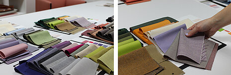Individual fabric samples in the same color group are laid out together on a white table.