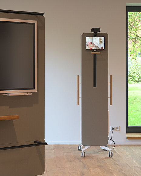 It is a close-up of two display racks. One is only partially visible, while the other is visible in its entirety. Both have a white frame and a beige back panel.