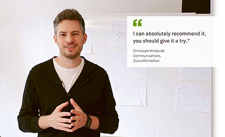 A man named Christoph Kristandl is standing in front of a whiteboard at the Zukunftsinstitut. Next to him is a quote that reads, “Highly recommended—you should give it a try.”