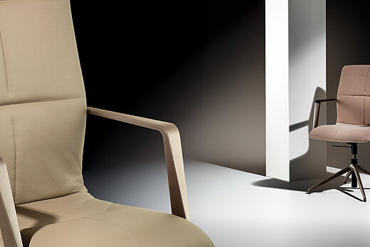 Decide office chairs in studio setting, product presentation scene