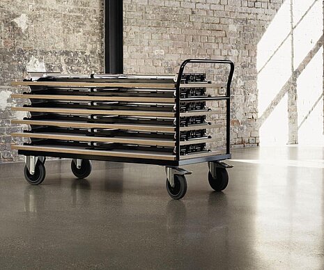 mAx folding tables stacked on transport trolley, storage situation