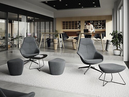 Yonda Lounge chairs and ottomans in open office lounge area