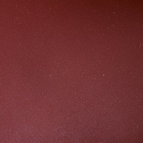 Color swatch: Pantone 3523 C sienna red