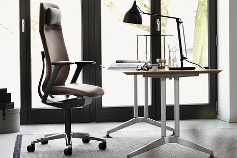 AT swivel chair in home office with window backdrop
